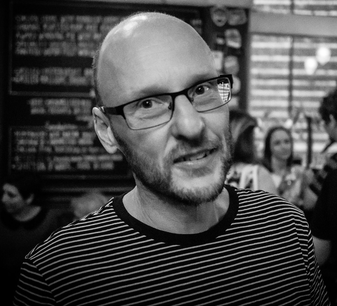 Headshot of Richard Osbourne in grayscale.