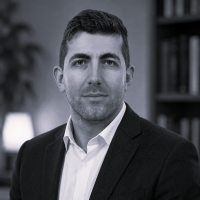A headshot of Dr Stergios Aidinlis in grayscale.